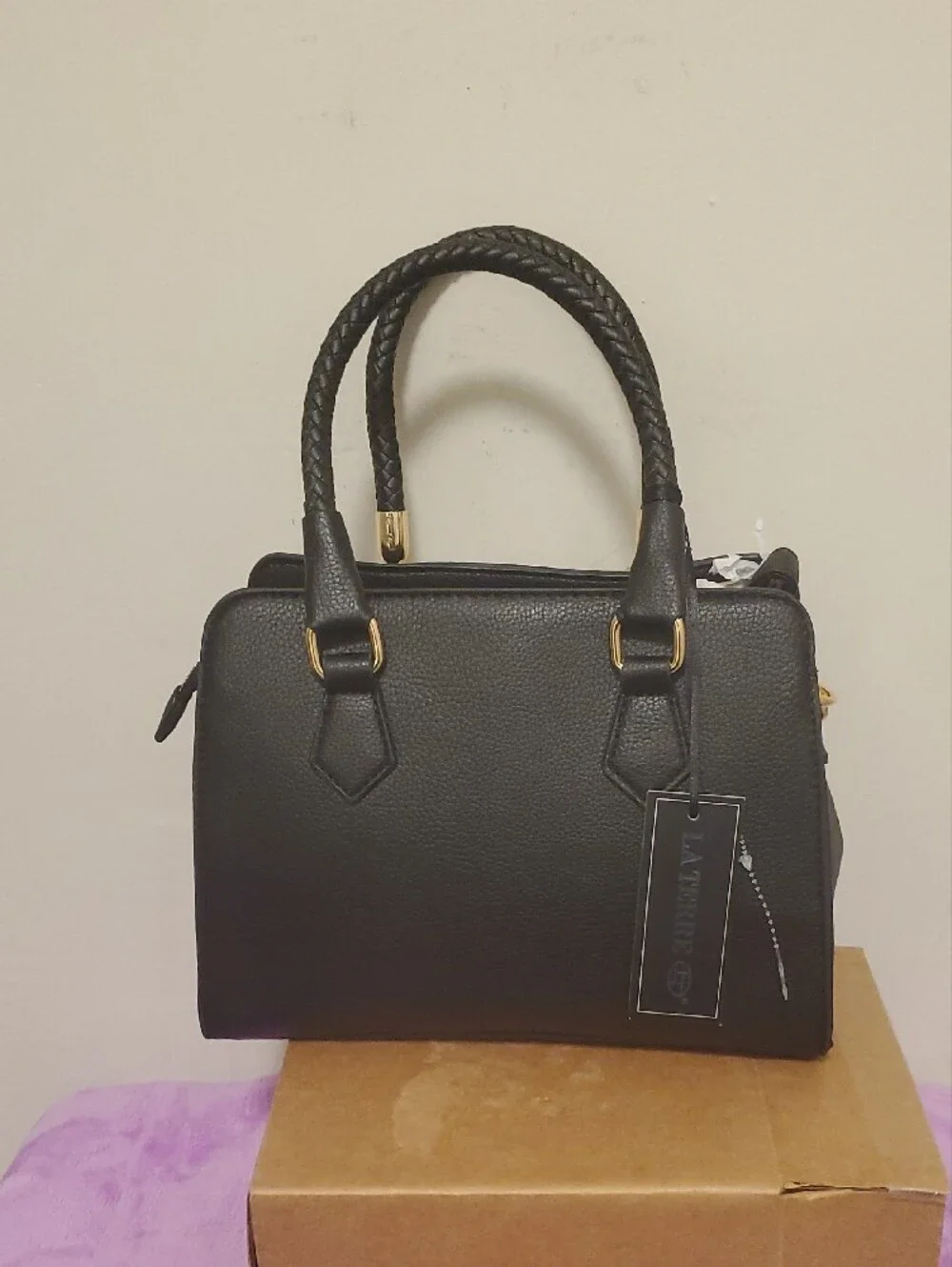 Structured Black Satchel with Braided Handles and Gold Accents